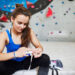 climbing tape, woman using climbing tape at the bouldering gym